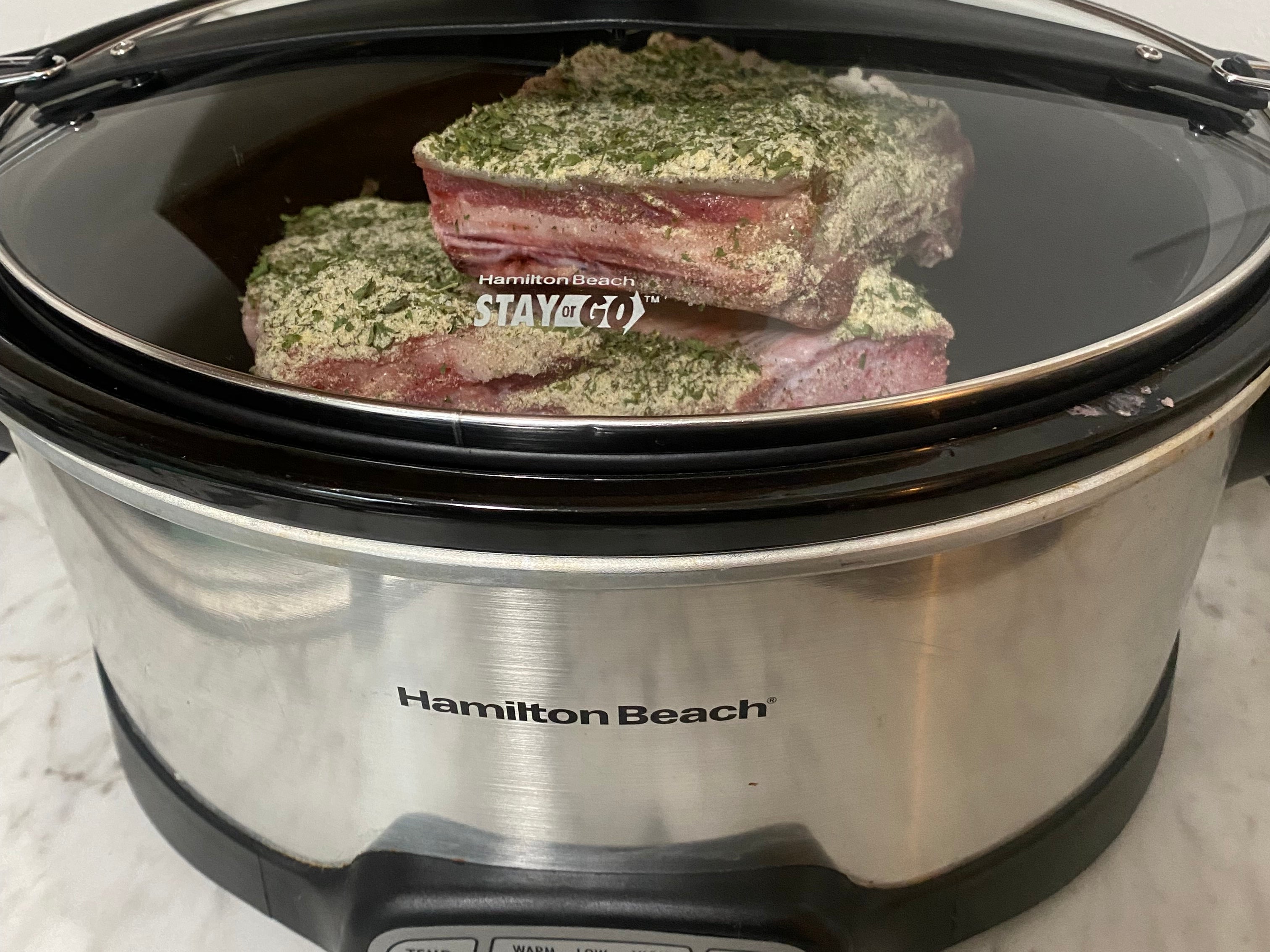 Beef Short Ribs covered with dry ranch seasoning and cooked in a slow cooker