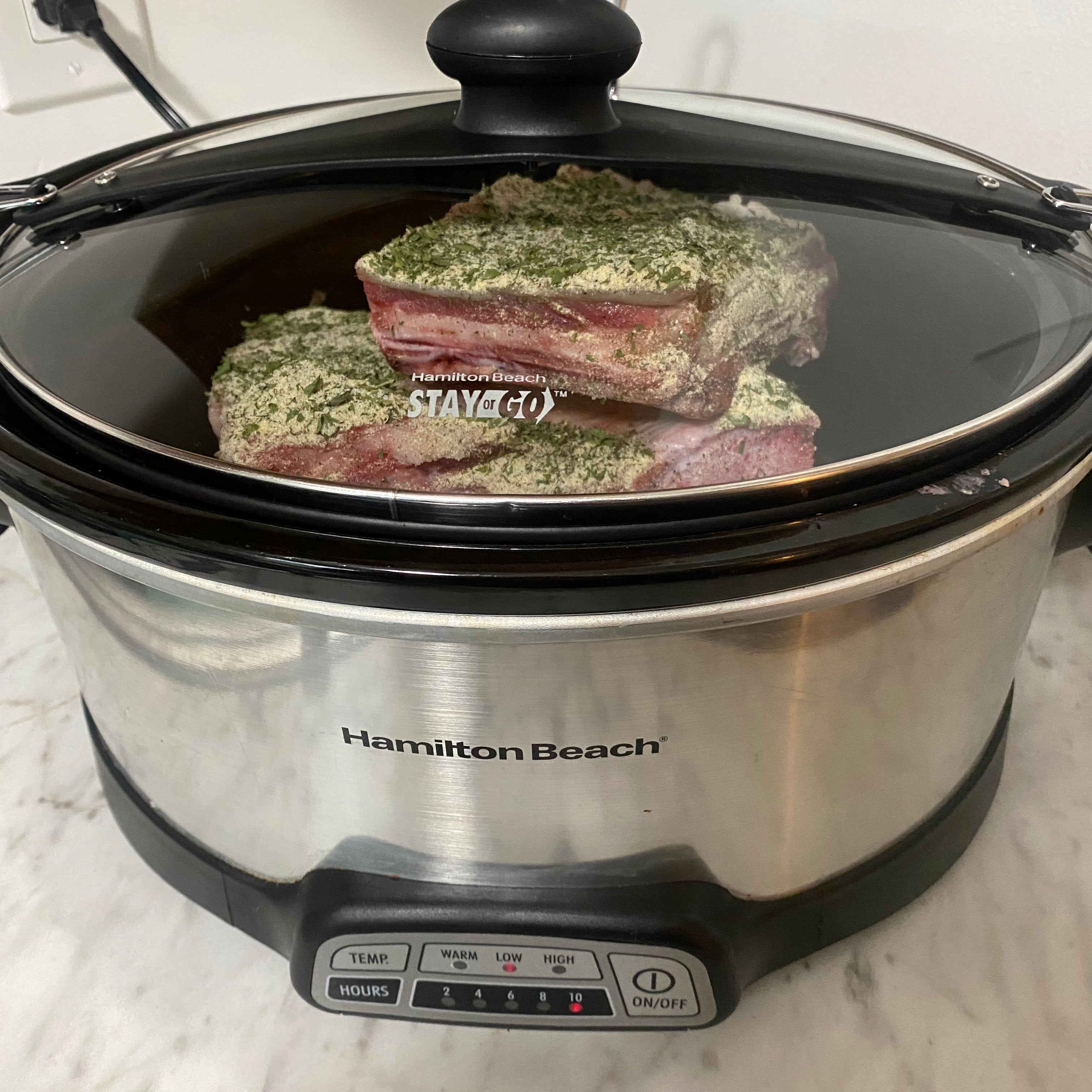 Beef Short Ribs covered with dry ranch seasoning and cooked in a slow cooker