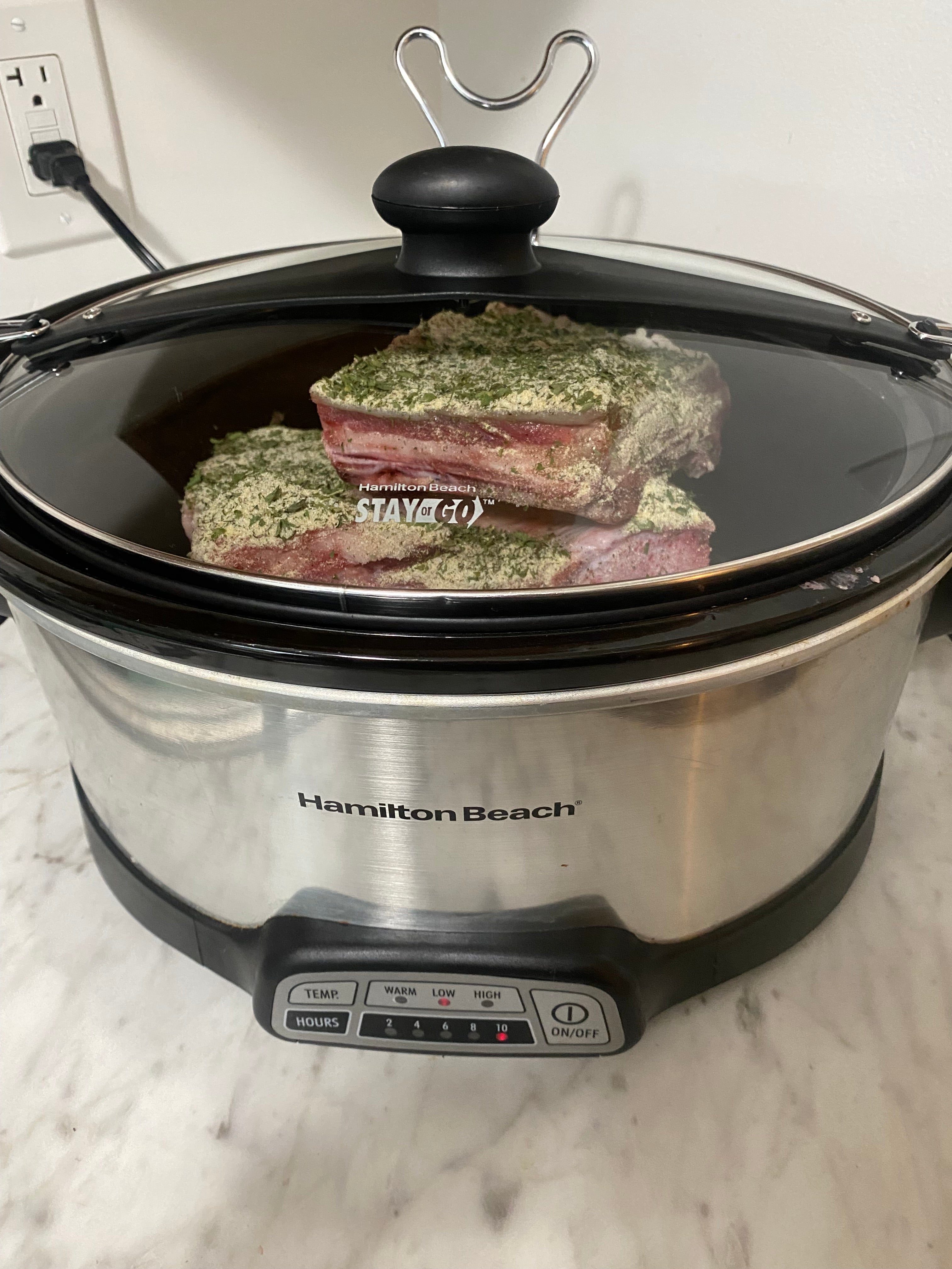 Beef Short Ribs covered with dry ranch seasoning and cooked in a slow cooker